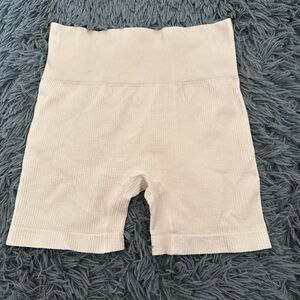 pale pink ribbed high waisted biker shorts (part of a set)